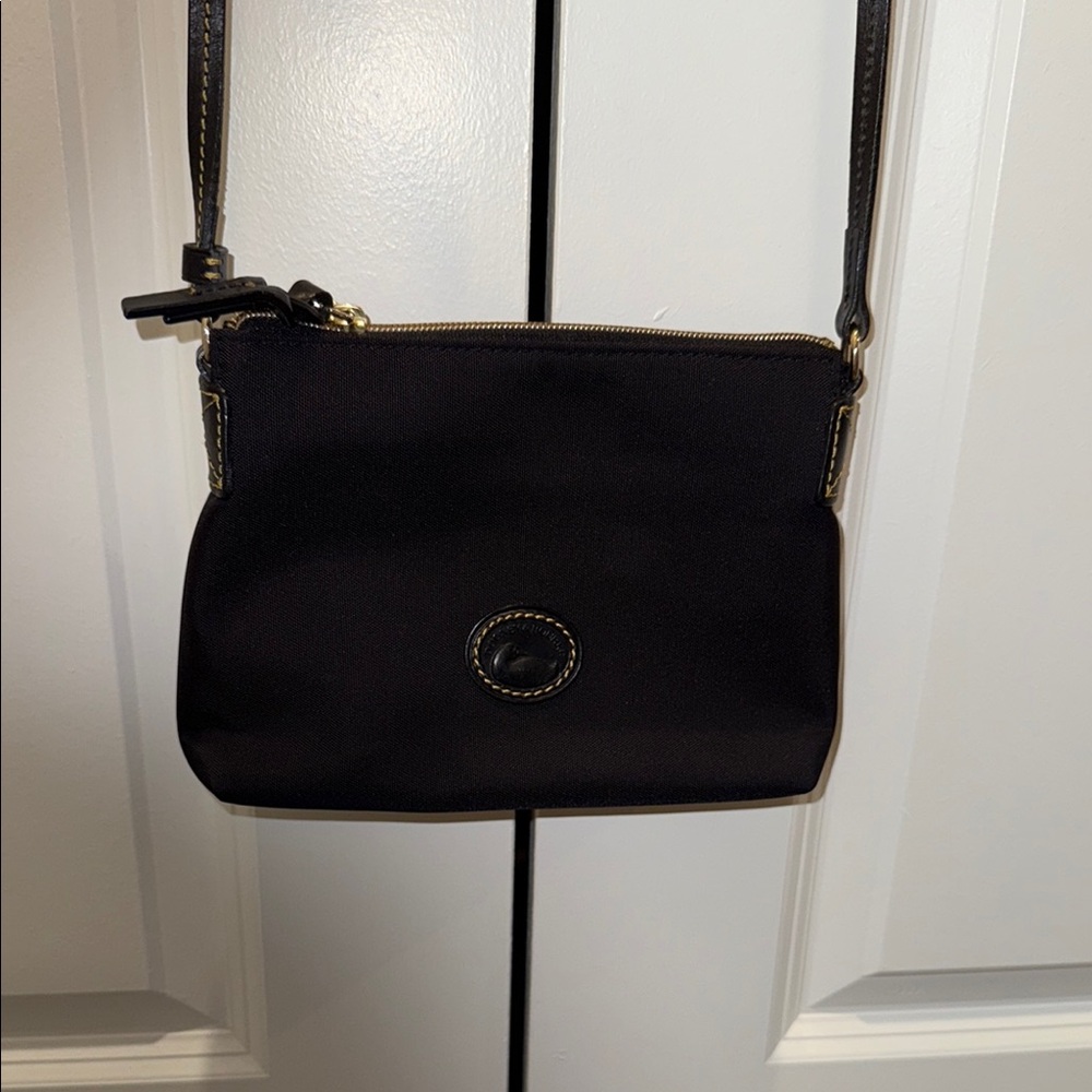 Dooney & Bourke Black Crossbody Bag with Flap Closure